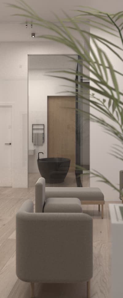 Interior detail with planting, armchair, and adjoining bathroom