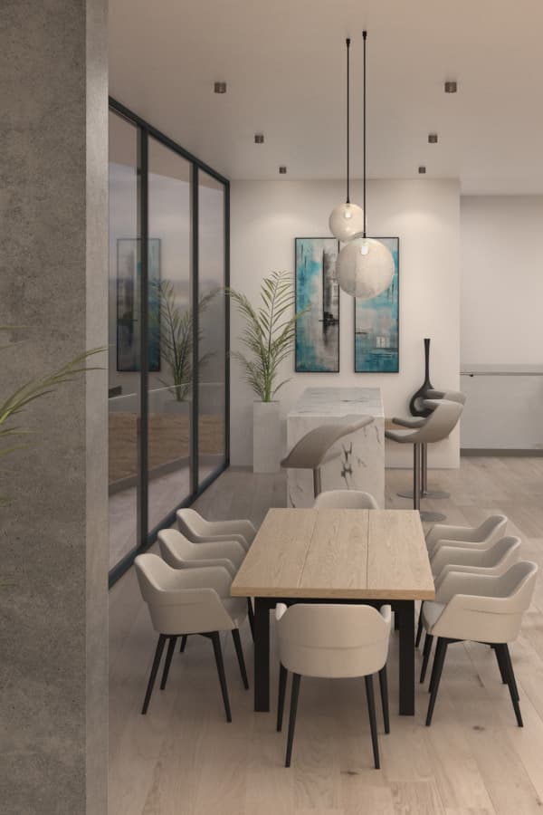 Dining table and pendant lights beside full-height windows